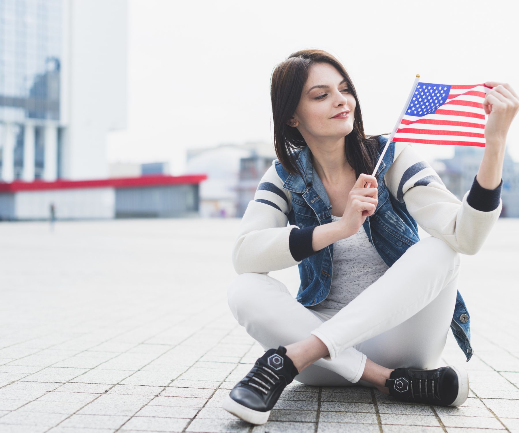 woman-sitting-square-holding-ame